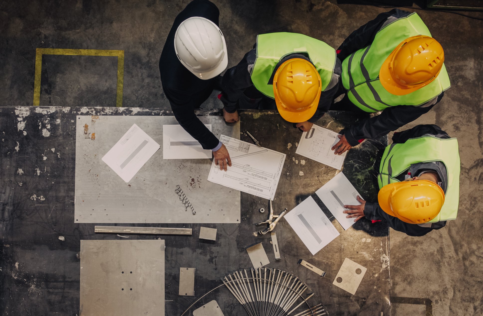 Workers and manager with documents